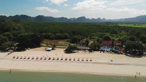 Wide-drone-shot-of-a-tropical-island-beach