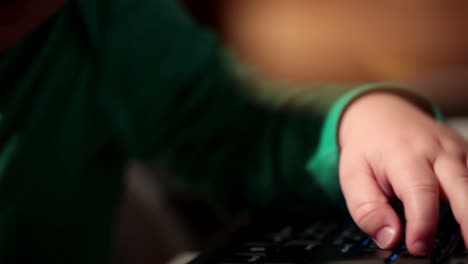 Two-year-old-boy-is-playing-with-computer