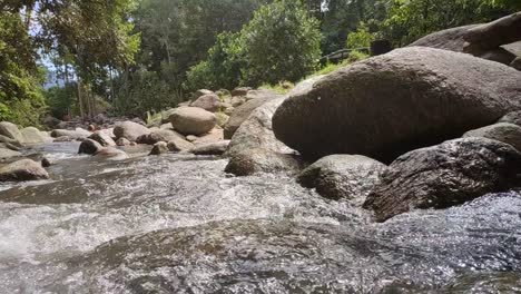 Very-relaxing-tropical-water-stream-at-Ulu-Bendul,-Malaysia,-Negeri-Sembilan