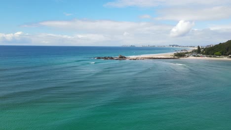sandy seashore of beach at palm beach in gold coast city, australia