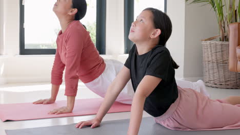 fitness, family and asian yoga by mother