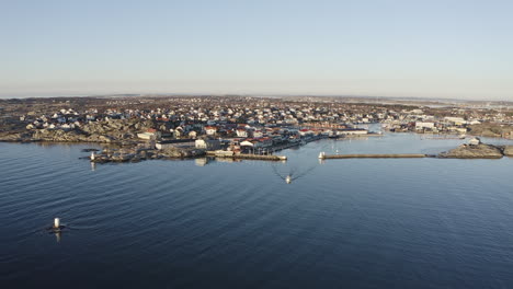 drone wide shot of a harbor port at öckerö island municipality in gothenburg archipelago, sweden