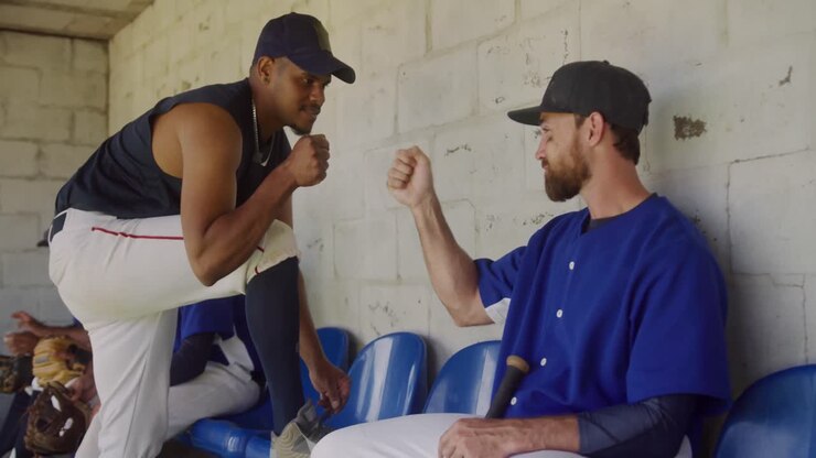 Baseball players discussing together