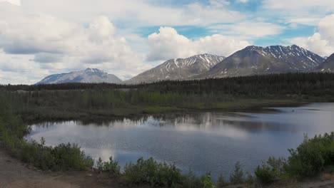 4K-Drone-Video-of-Mountain-Peaks-and-Granite-Creek-near-Denali-National-Park-in-Alaska-on-Sunny-Summer-Day