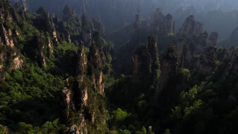 Aerial-tilt-down-shot-of-Imperial-Writing-Brush-Peak-in-Tianzishan