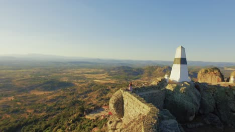 aerial views of a historical village and landmark