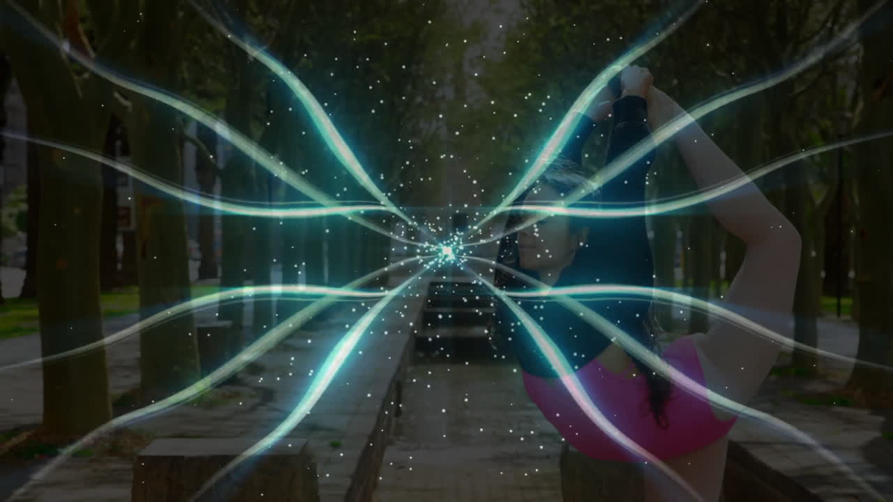 woman performing bow yoga pose in urban fitness park, showing light trails and particle effects