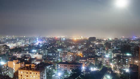 a mesmerizing timelapse of the dhaka skyline from mohammadpur, capturing the rising moon as it illuminates the urban landscape.