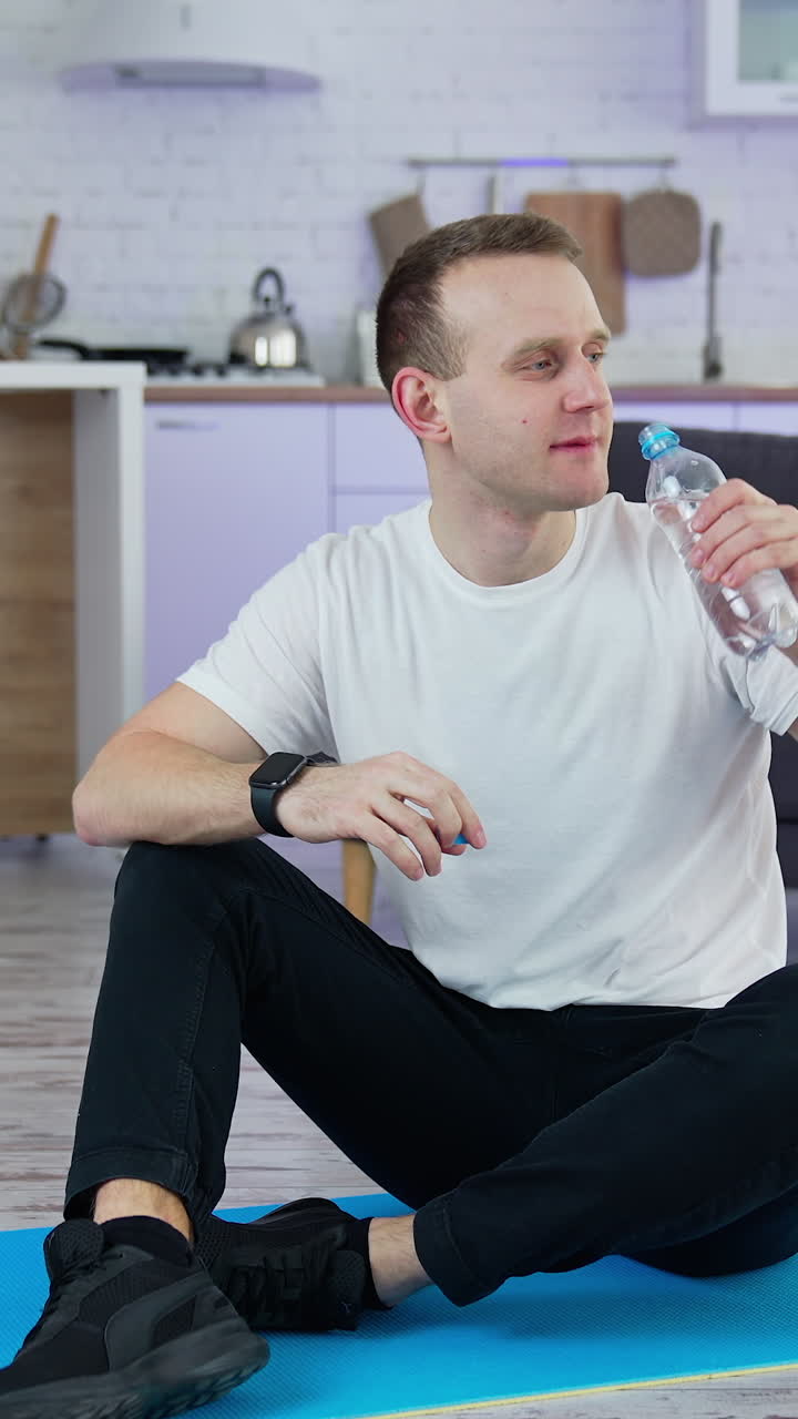 Quarantine isolation indoor training. Sporty handsome man doing exercise at home