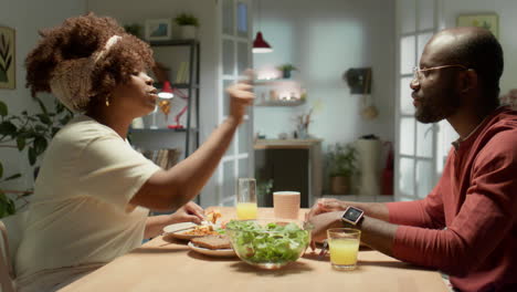 african american couple quarreling during dinner at home