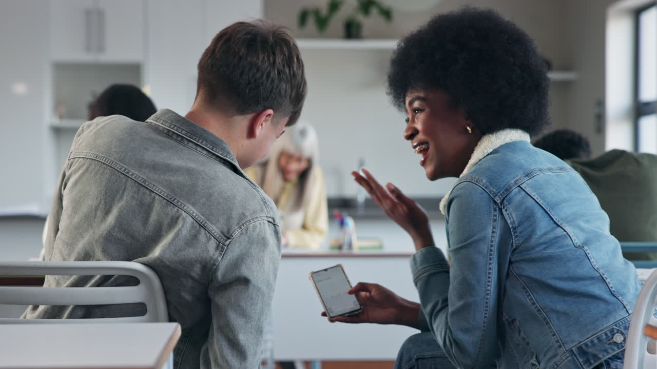 Students in classroom communicating with smartphone