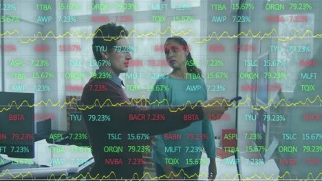 Animation-of-multicolored-trading-board-over-diverse-coworkers-discussing-reports-on-whiteboard