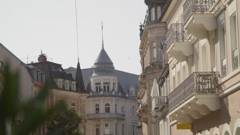 a row of historic buildings with balconies in a european city