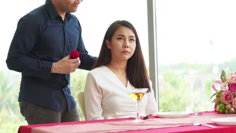 happy romantic couple eating lunch at restaurant