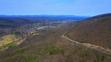 aerial drone video footage of a scenic, beautiful, winding mountain highway in the appalachian mountains