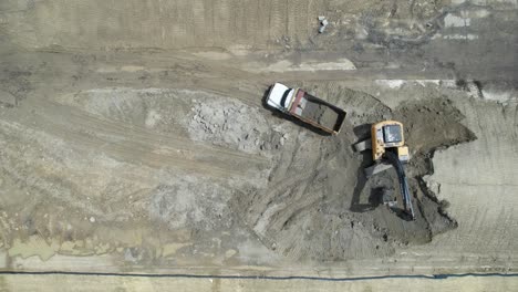 an aerial shot of excavation at construction site