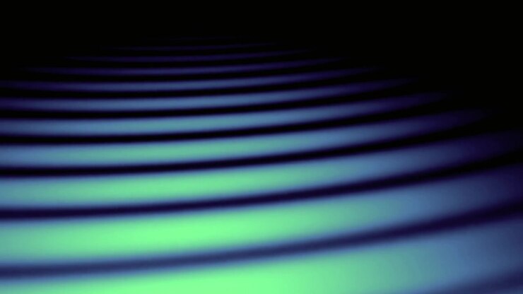 Abstract Background with Glowing Cyan and Blue Light Waves
