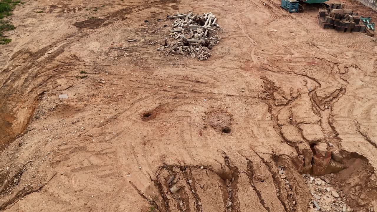 Construction Site with Excavation and Debris