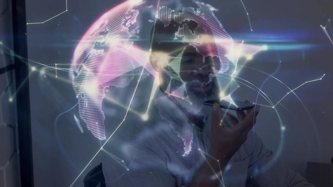 Man speaking into smartphone initiating tech demo with glowing network forming rotating globe