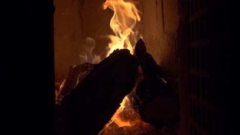 firewood burning in tile stove - 180 fps slow motion