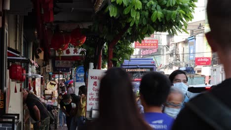 pedestrians navigating a crowded city sidewalk