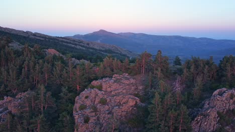 right to left aerial drone view of mountain landscape in northern madrid, spain