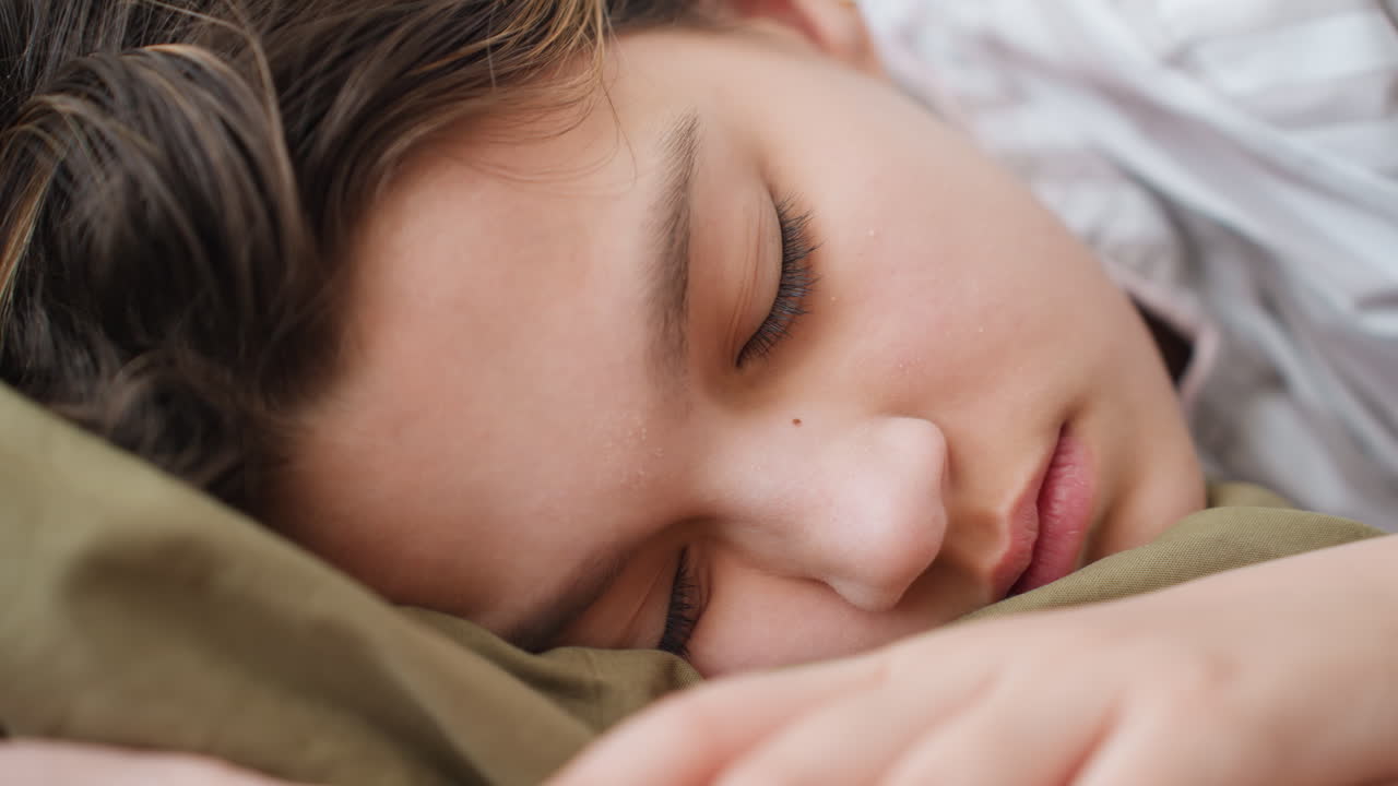 Teen Performer Takes Peaceful Break On Sofa, Calm Youthful Creator Lying On Couch In Gentle Light, Serene Young Artist Enjoying Quiet Moment With Relaxed Posture And Soft Natural Illumination