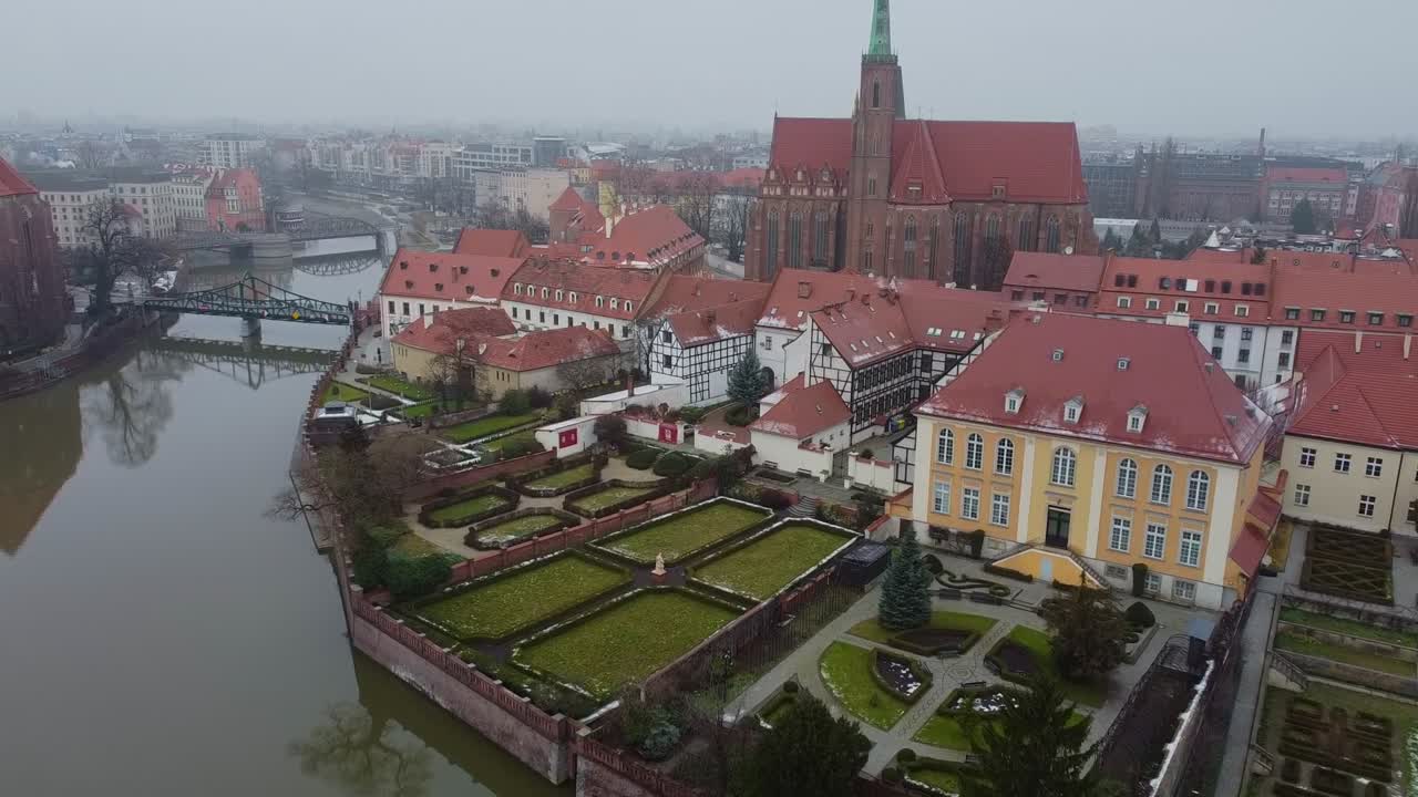 Cinematic perspective over oldest part of Wroclaw on grey moody day - Cathedral Island, Wrocław, Poland