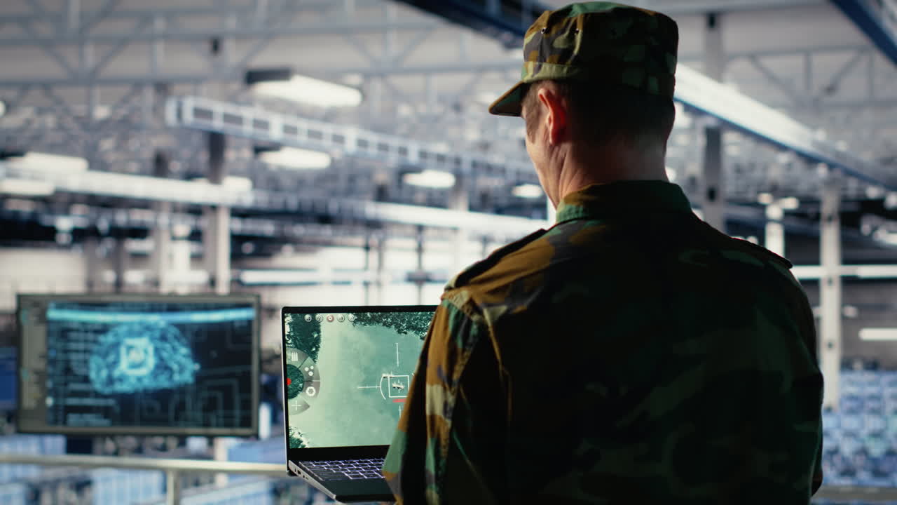 Military Data Center Specialist Using Radar Software On Laptop