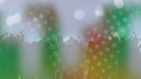 animation of green and white squares over dancing crowd with grey smoke
