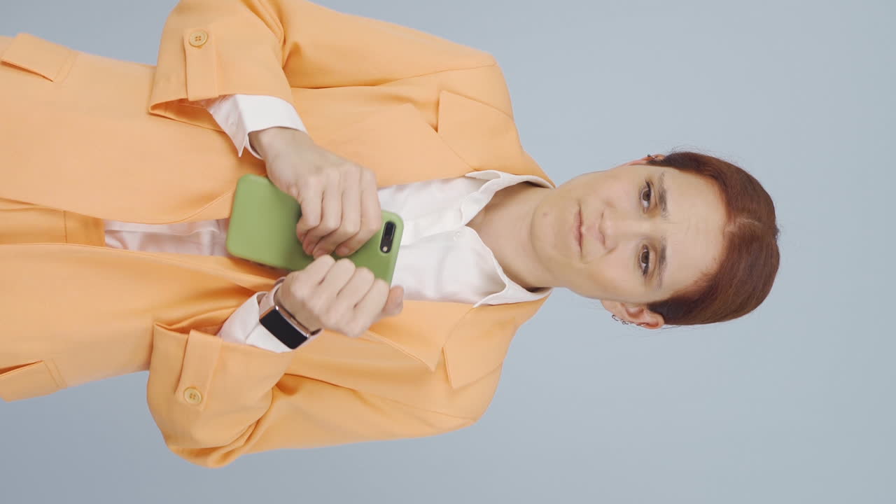 Vertical video of Anxious and fearful business woman.