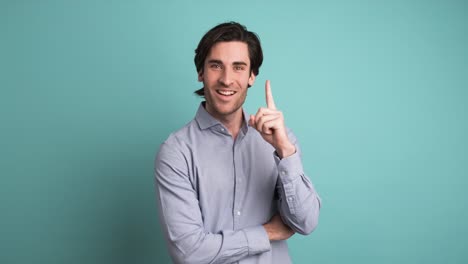 thoughtful man with great idea in blue studio