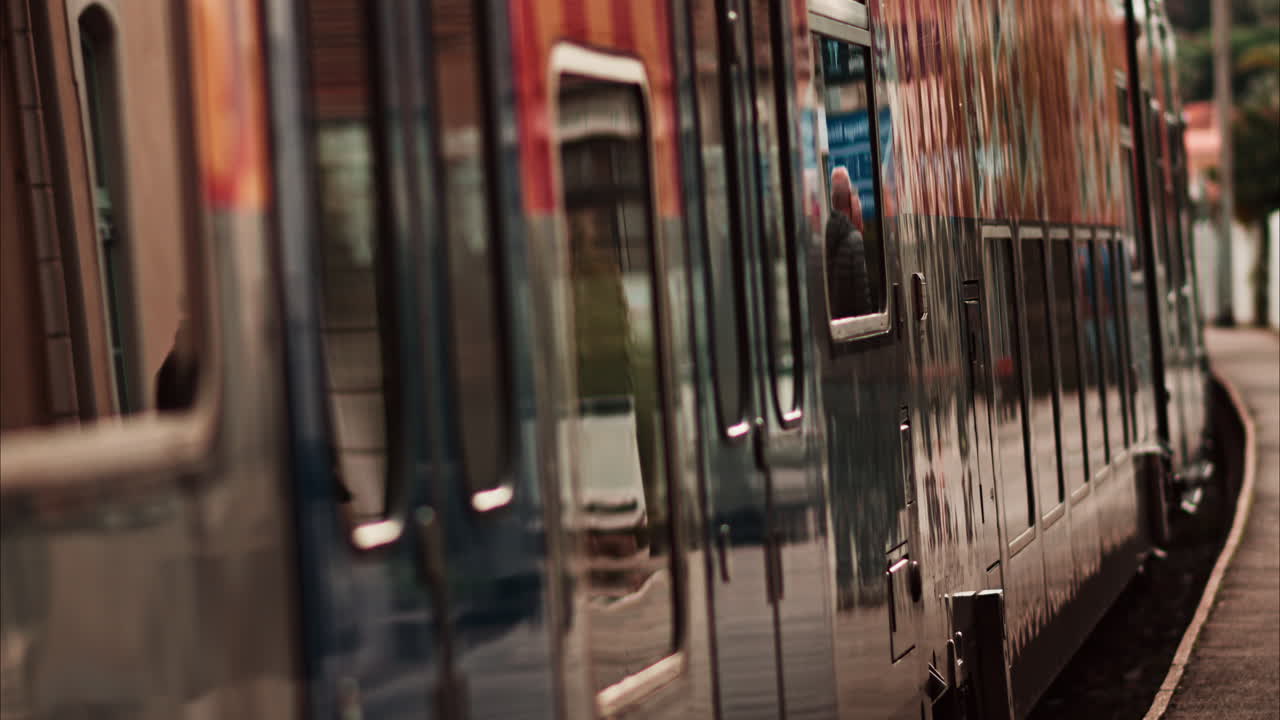 Train arriving at the station in Nice, France, slow motion