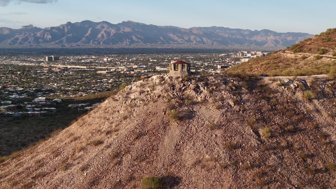 Gazebo on Sentinel Peak (A Mountain) in Tucson, Arizona by drone with Mountains in background