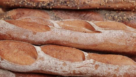 fresh artezan bread close-up. artisan bread is making by skill bakers using natural and high-quality ingredients. food with health and flavour benefits. bakery shop and market