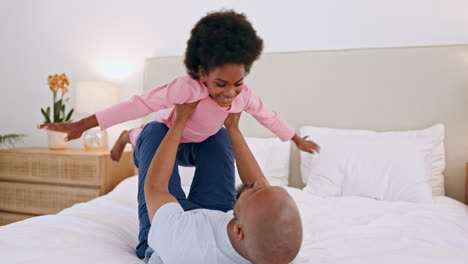 Black-family,-father-and-a-daughter-flying