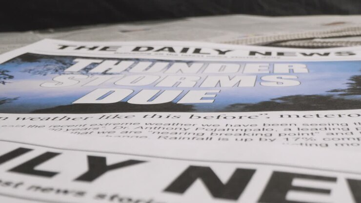 Newspaper Headline Discussing Extreme Weather Conditions And Thunder Storms In Global Warming Crisis 1