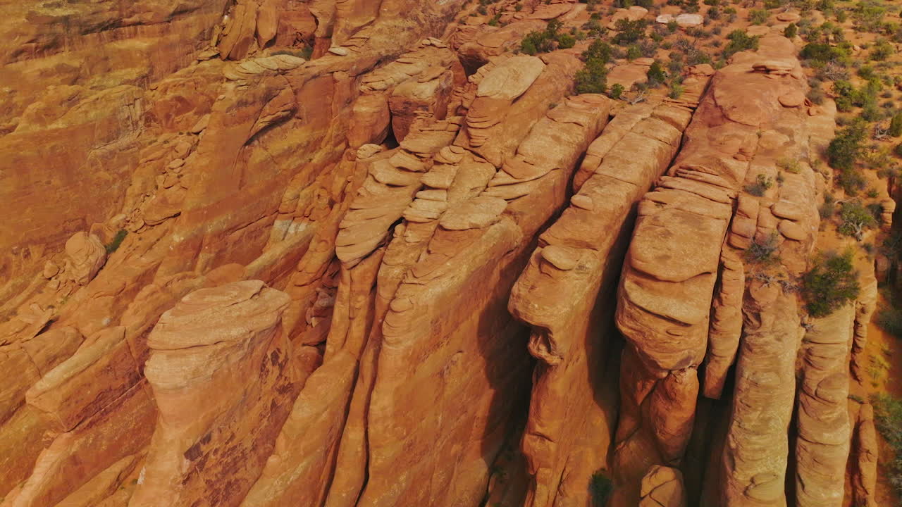 Geological formation in the Arches national Park in Utah, USA. Amazing bare rounded rocks in the shape of plates piled together. Top view.