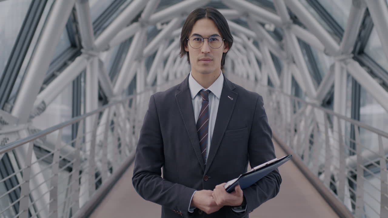 Businessman in modern city bridge