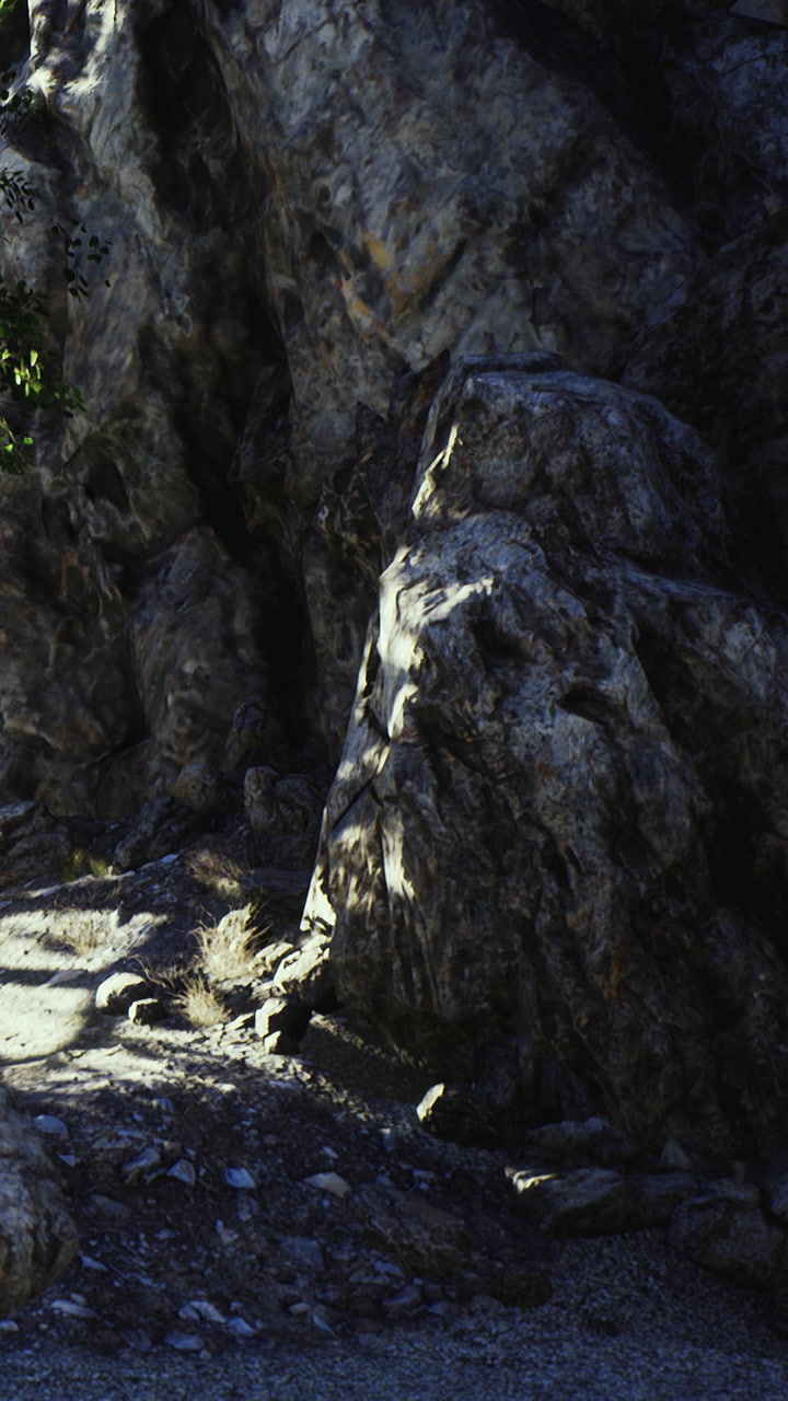 Rock formation near canyon in sunlight at midday