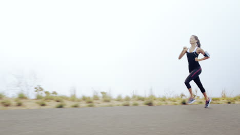 woman-running-on-road-close-up-shoes-steadicam-shot