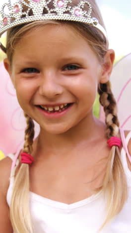 young girl pretending to be a fairy