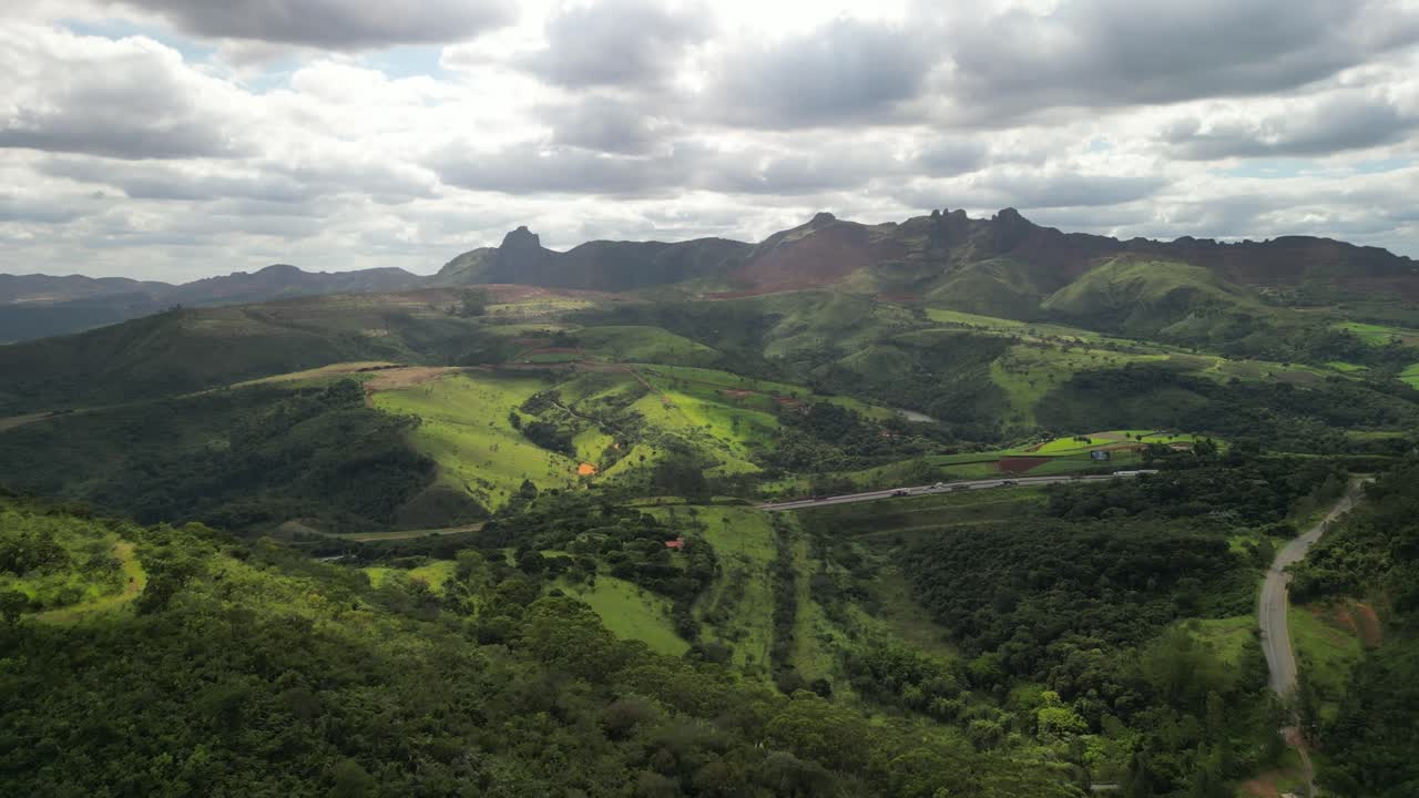 Drone view of the scenic mountains of Minas Gerais, Brazil — lush landscapes, rolling hills, and dramatic natural beauty.