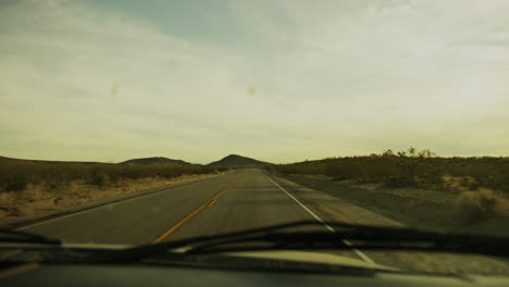Driving route 66 at sunset