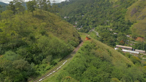 aerial drone shot down demodara loop railway line train track in sri lanka