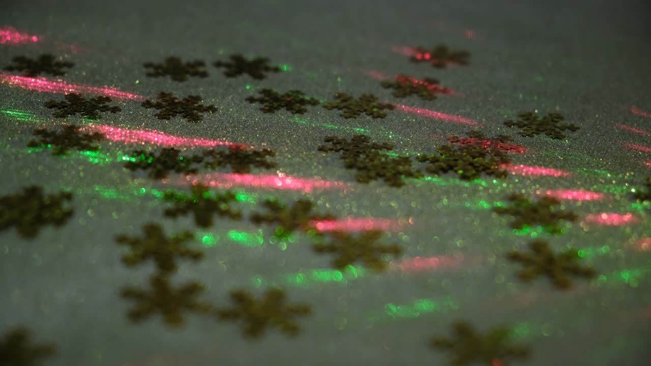 Festively decor for home interior  with golden snowflake  on blurred sparkling fairy background. Night scene.
