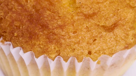 detail shot of simple, healthy and traditional muffin freshly baked rotating, close up view in 4k