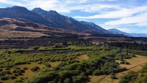 aerial shot of a stunning mountain landscape in glenorchy, new zealand