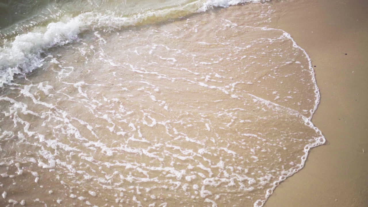 Slow Motion . Waves at sunset, Ocean Beach in pattaya Thailand .