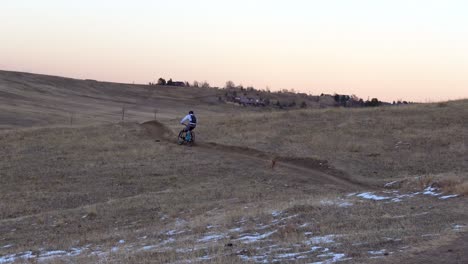 Mountain-bikers-riding-a-rural-trail